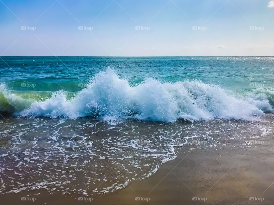 Waves crashing on beach