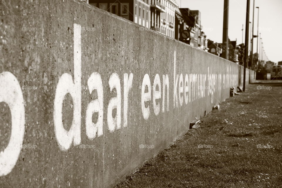 poem on a wall. a poem written on a small wall in antwerp