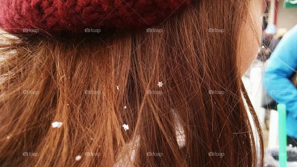 snowflakes and hair. girl with brown hair drawn to snow
