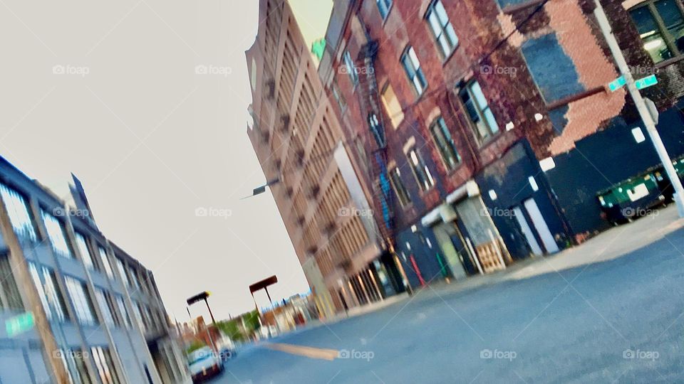 A street somewhere in “Long Island City”, Queens, NY is photographed askew on the diagonal to give the image even more of a gritty “Rock’n Roll” look. An image like this could perhaps adorn an album cover. 2021. Hypnotic Productions