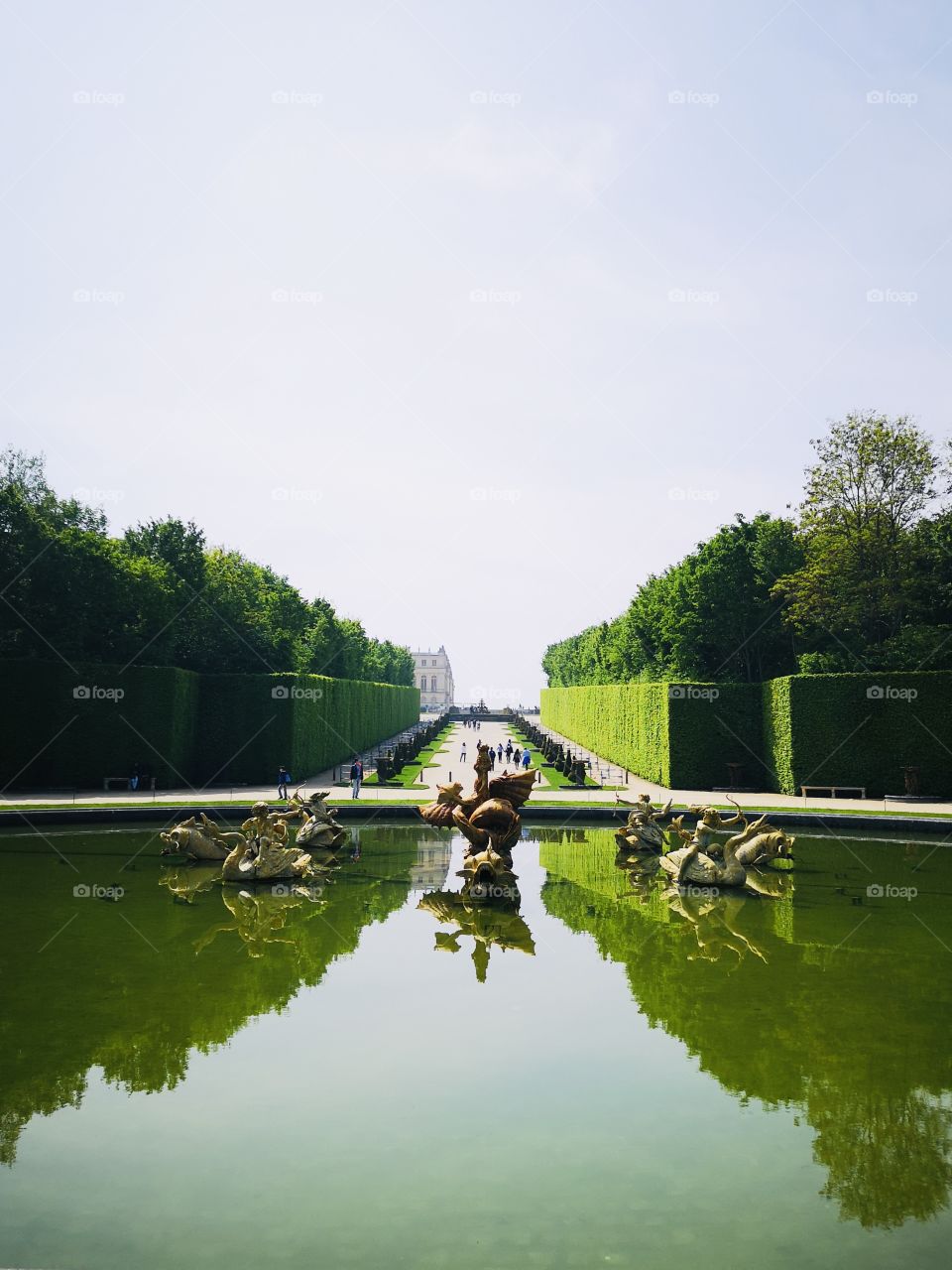 The garden of the Palace of Versailles on the reflection of the lake
