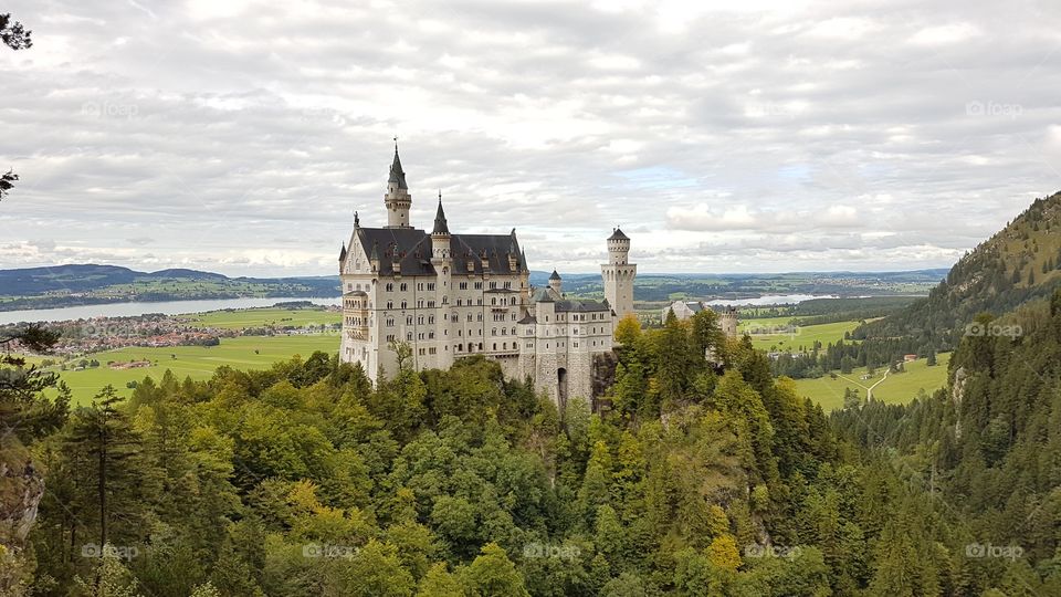 Fussen, magnificent landscape seen from above. Nature, mountains, trees, lake, castle, clouds...