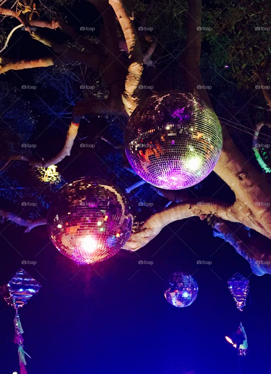 Disco balls in a tree