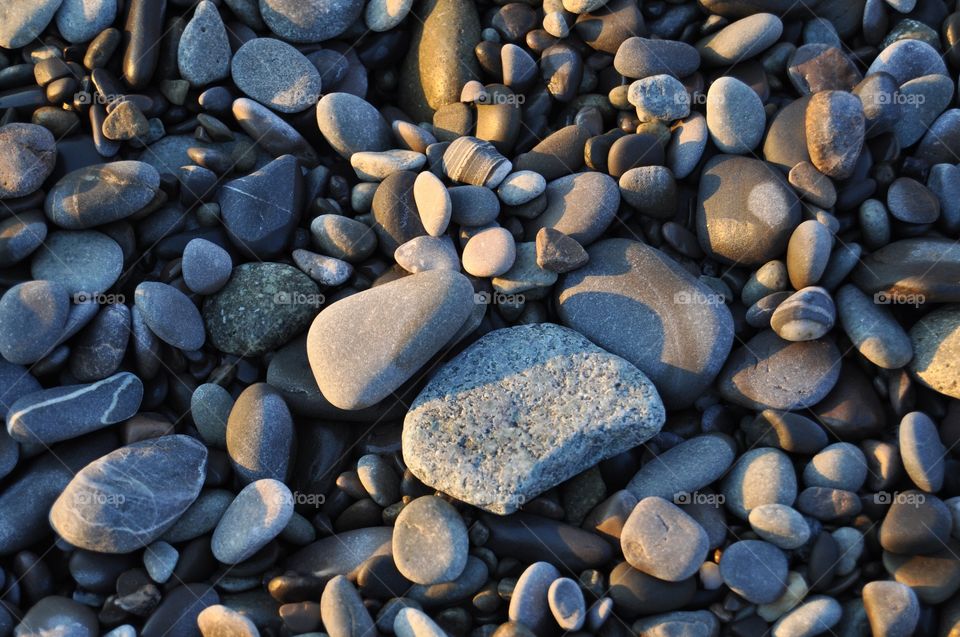 light and shadow on stones