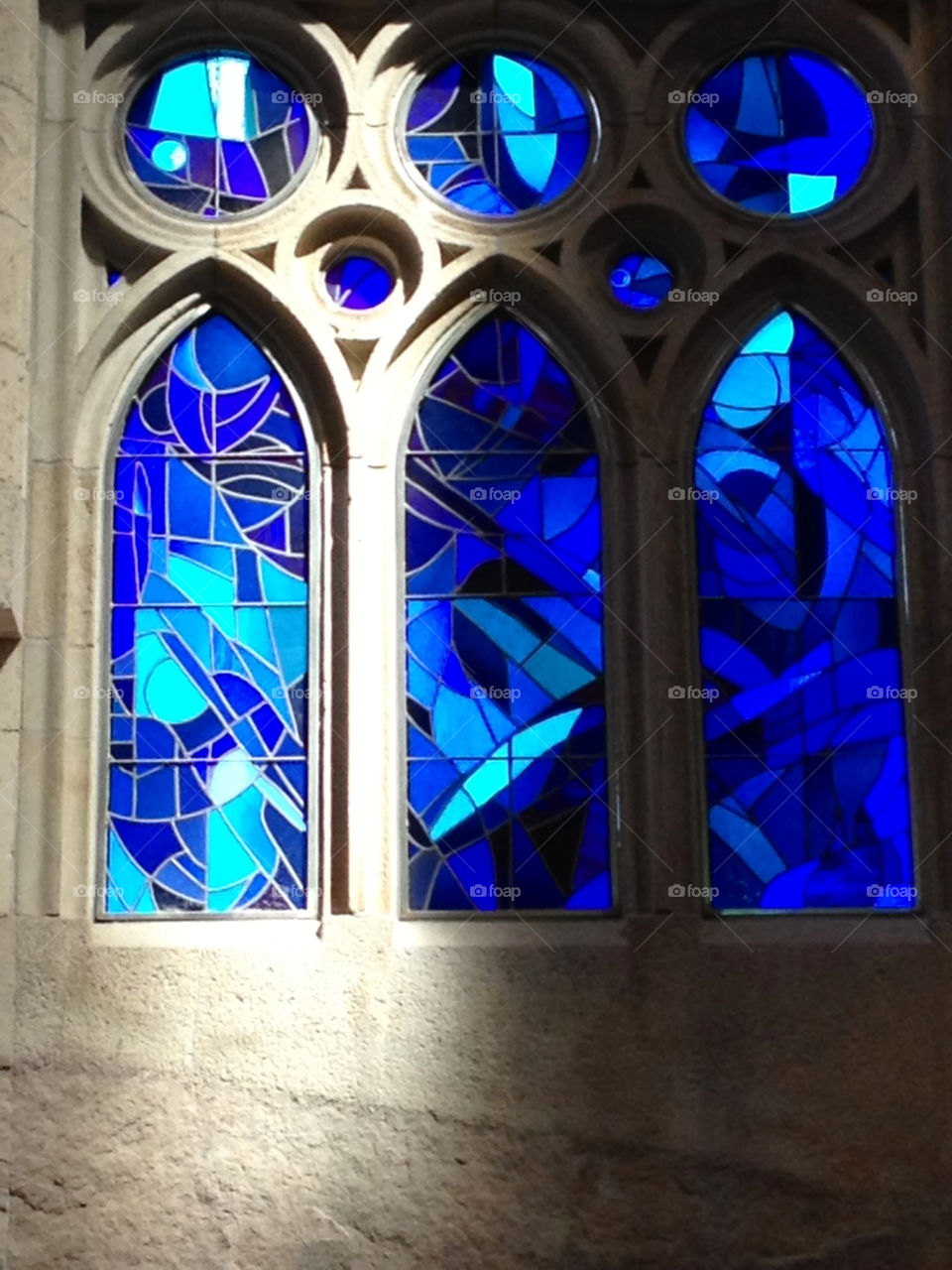 blue glass windows church by cabday