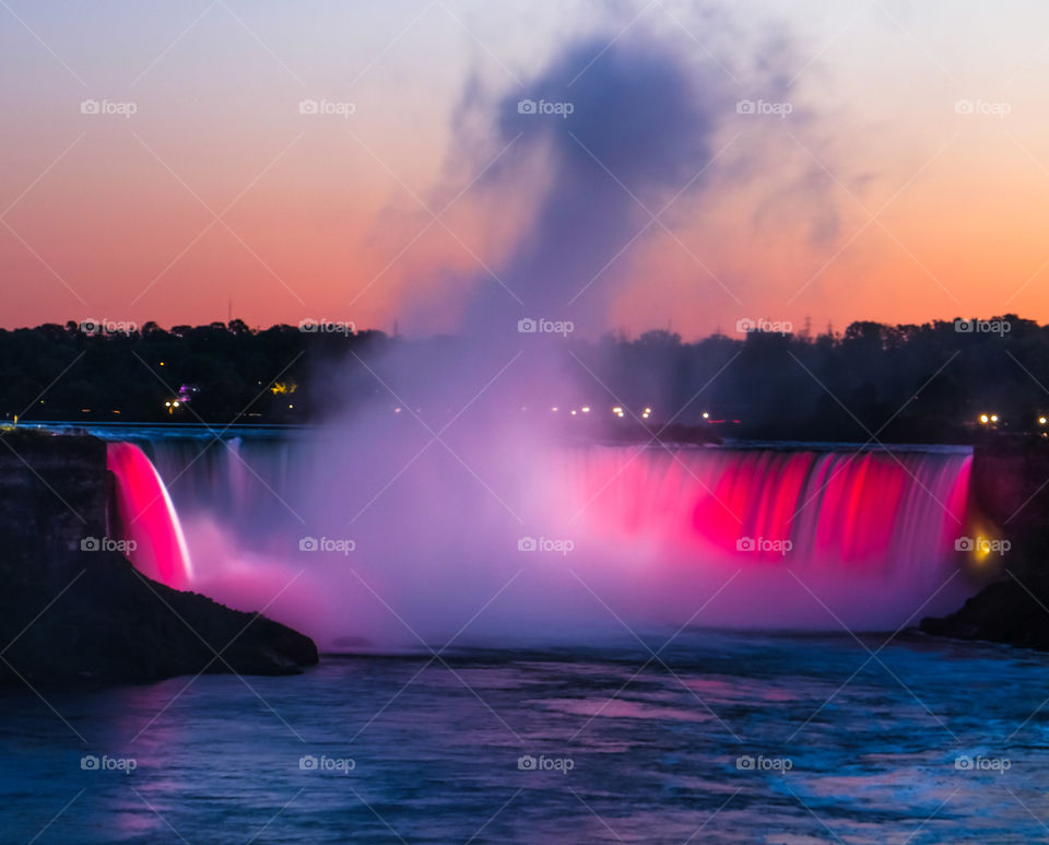 Hundreds of LED lights illuminate the falls