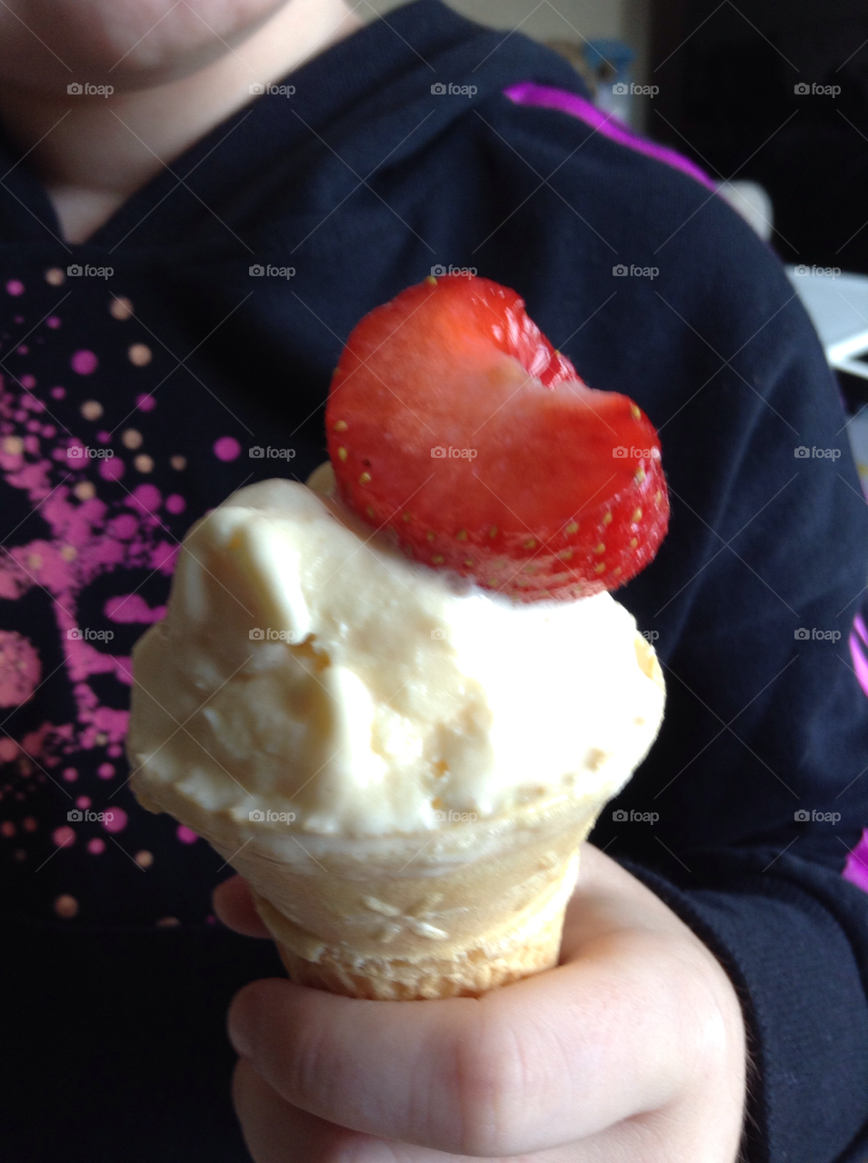 Ice cream cone. Strawberry ice cream 

