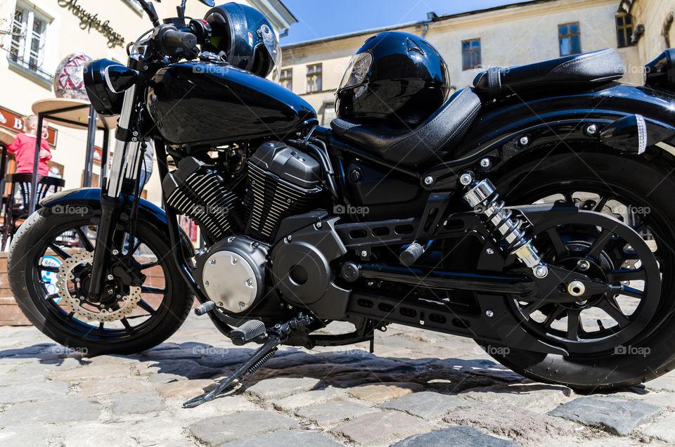 Black classic motorcycle on the street