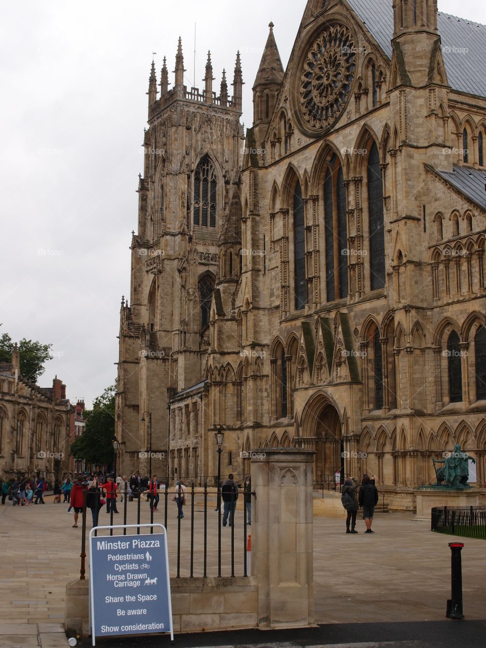 View of the famous York Minster with lots of people on summer vacation 