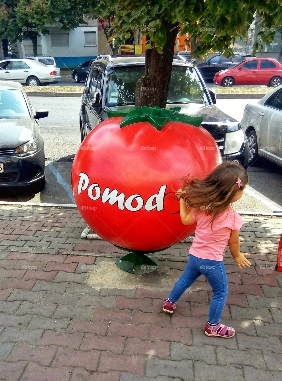 girl and tomato
