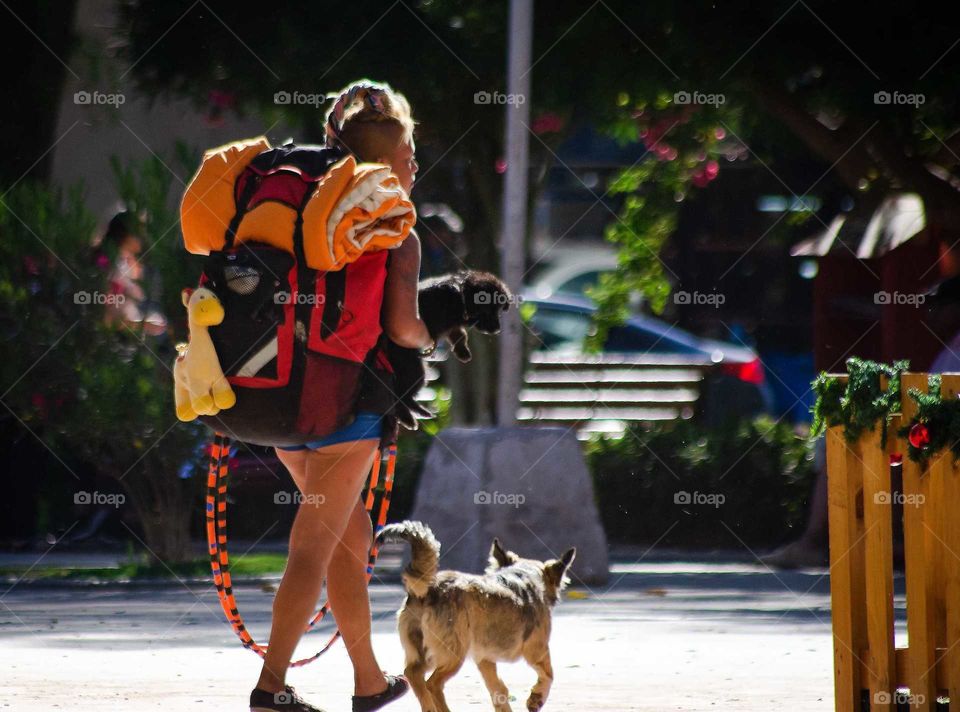 young woman walked with her camping backpack