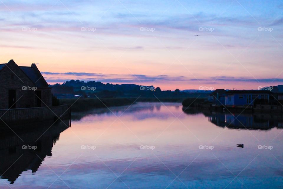 Sunset over a tidal river