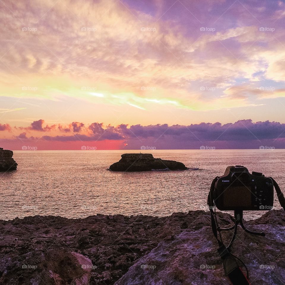 Camera on mini-tripod overlooking the sunrise