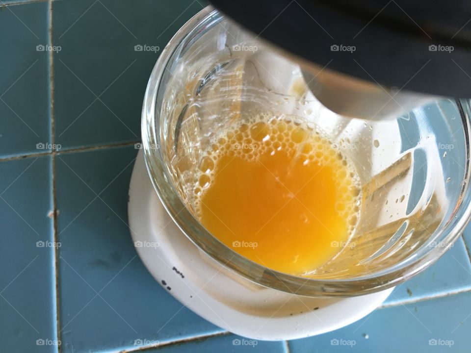 Vintage juicer making orange juice 