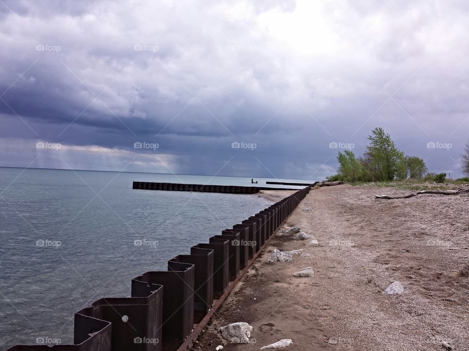 the eye of the storm. this photo was taken while walking the beach of Lake michigan. this storm happened to be rolling across the lake.