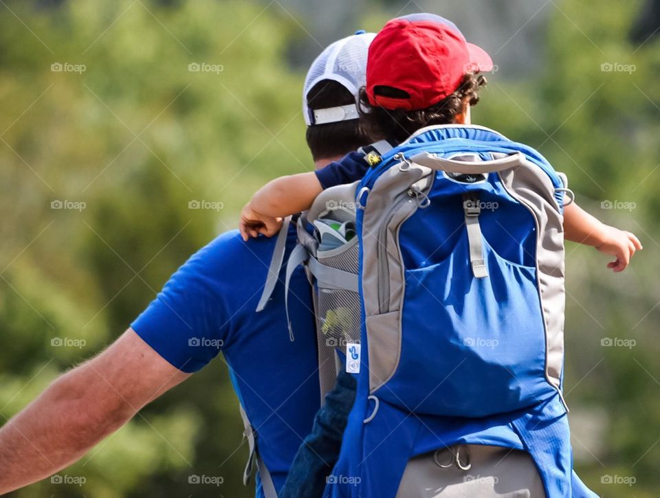 Dad and toddler hiking