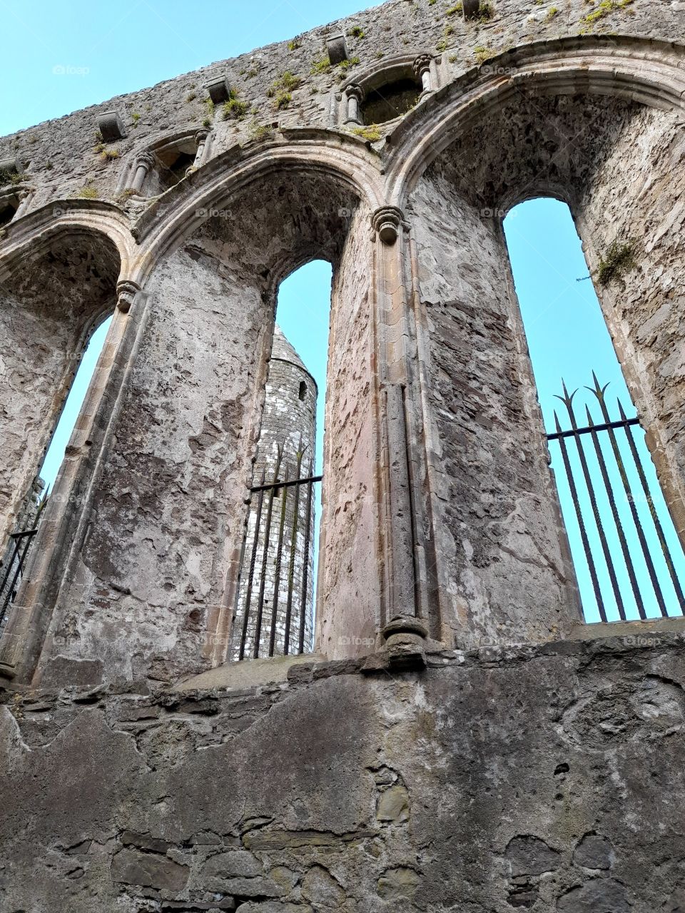 Round Tower through church window Cashel