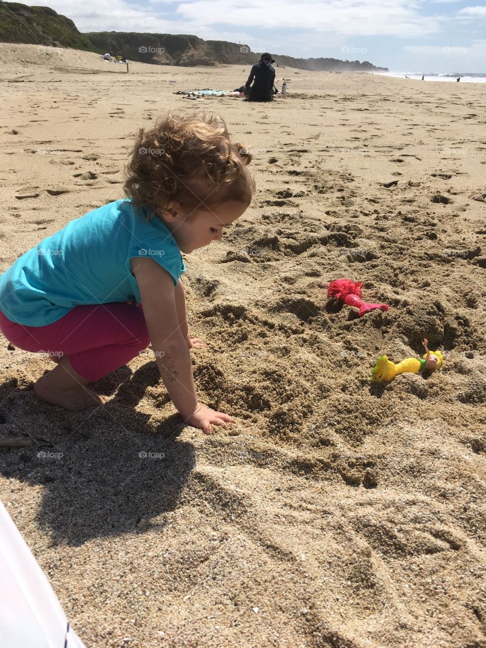 Playing in the sand.
