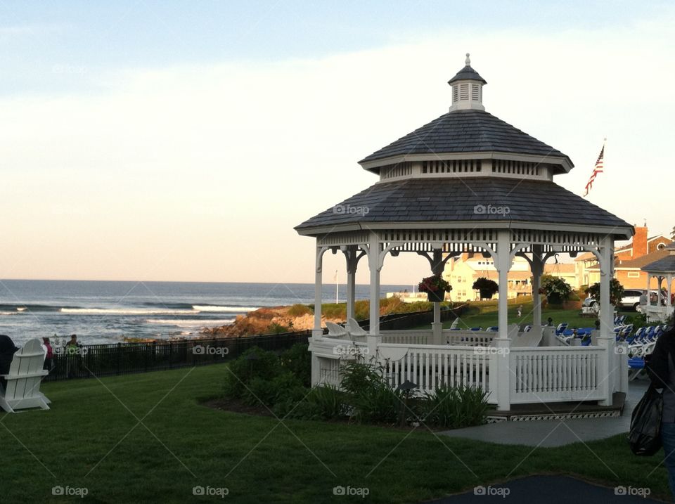 Gazebo on the ocean at sunset