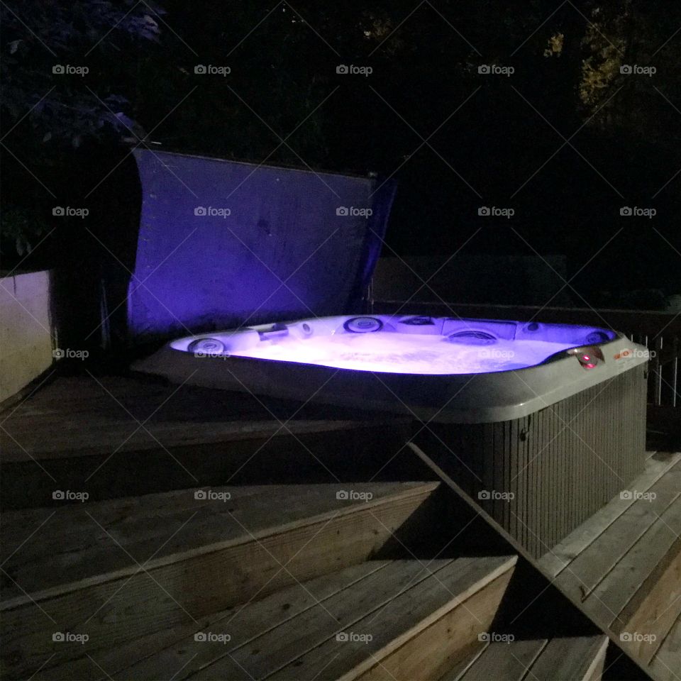 Glowing hot tub beautiful summer night 