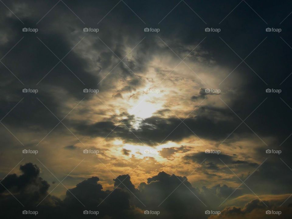 Storm cloud at sunset