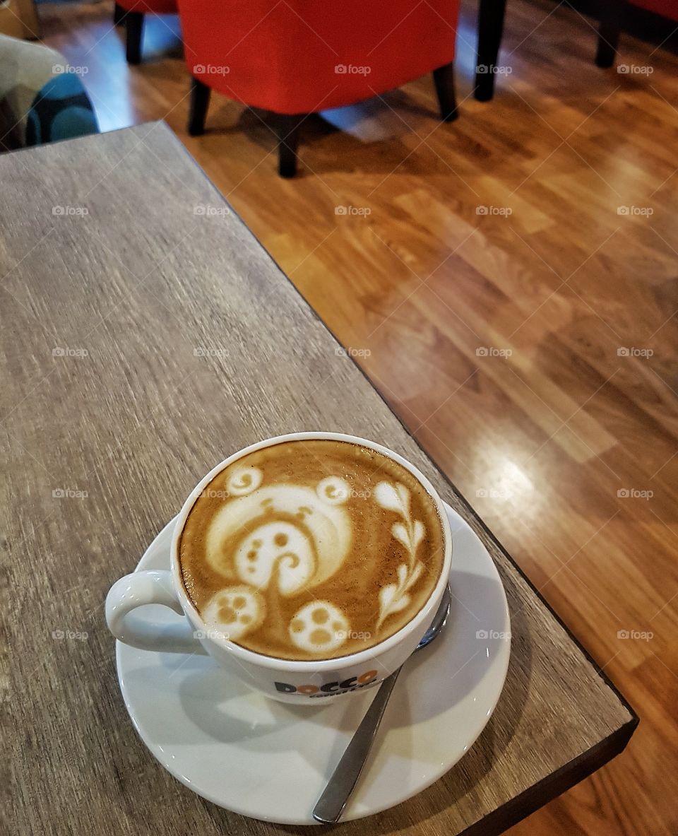 Coffee creature with chocolate design