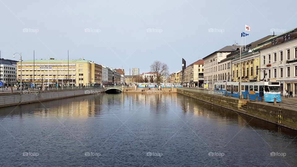 Tram and the canal moat in the city of Gothenburg Sweden - spårvagn vid kanalen Brunnsparken Göteborg Sverige 