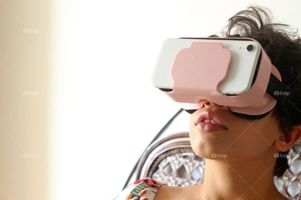 Girl watching movie in virtual reality