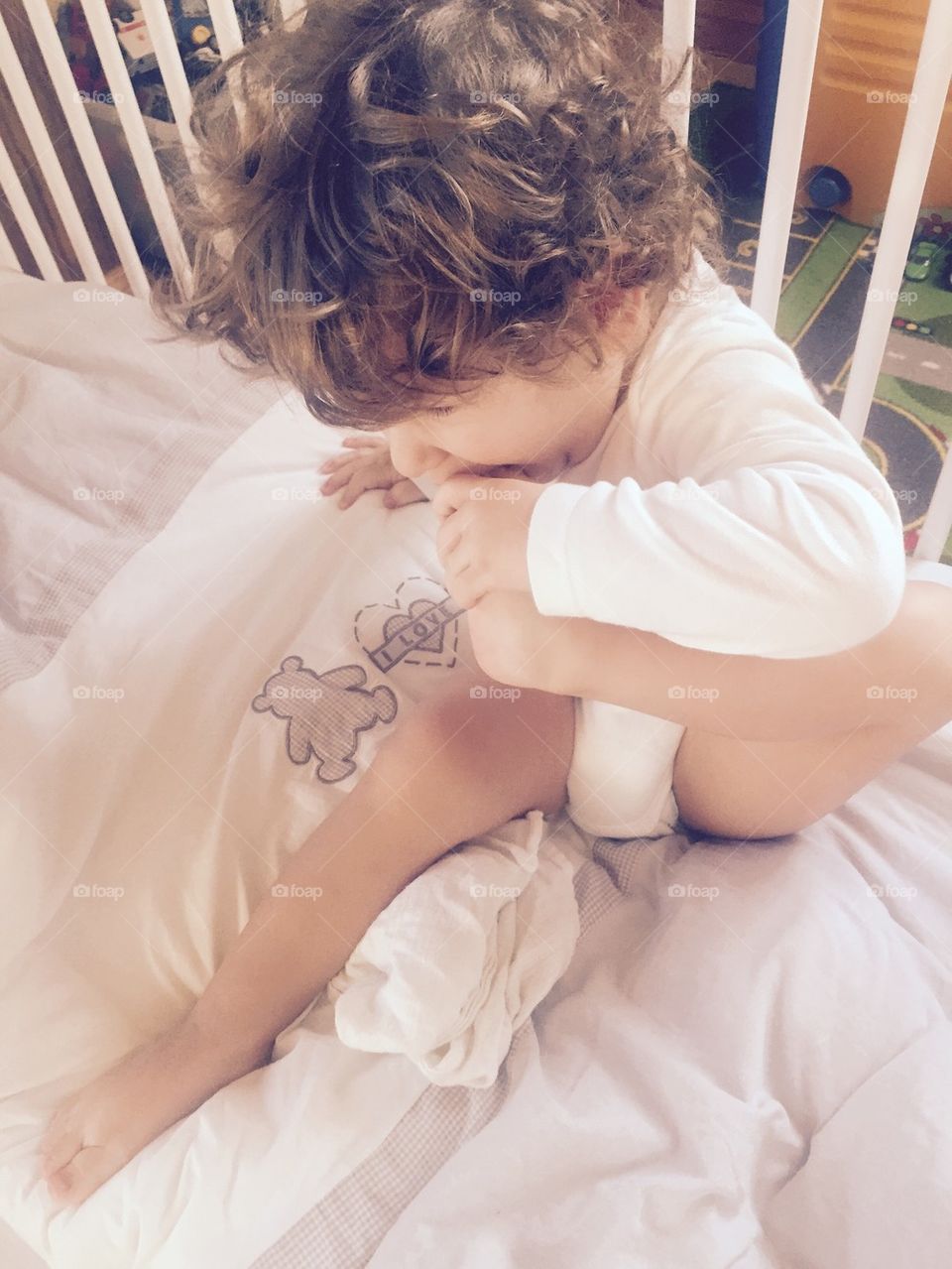 Boy Playing around in Bed