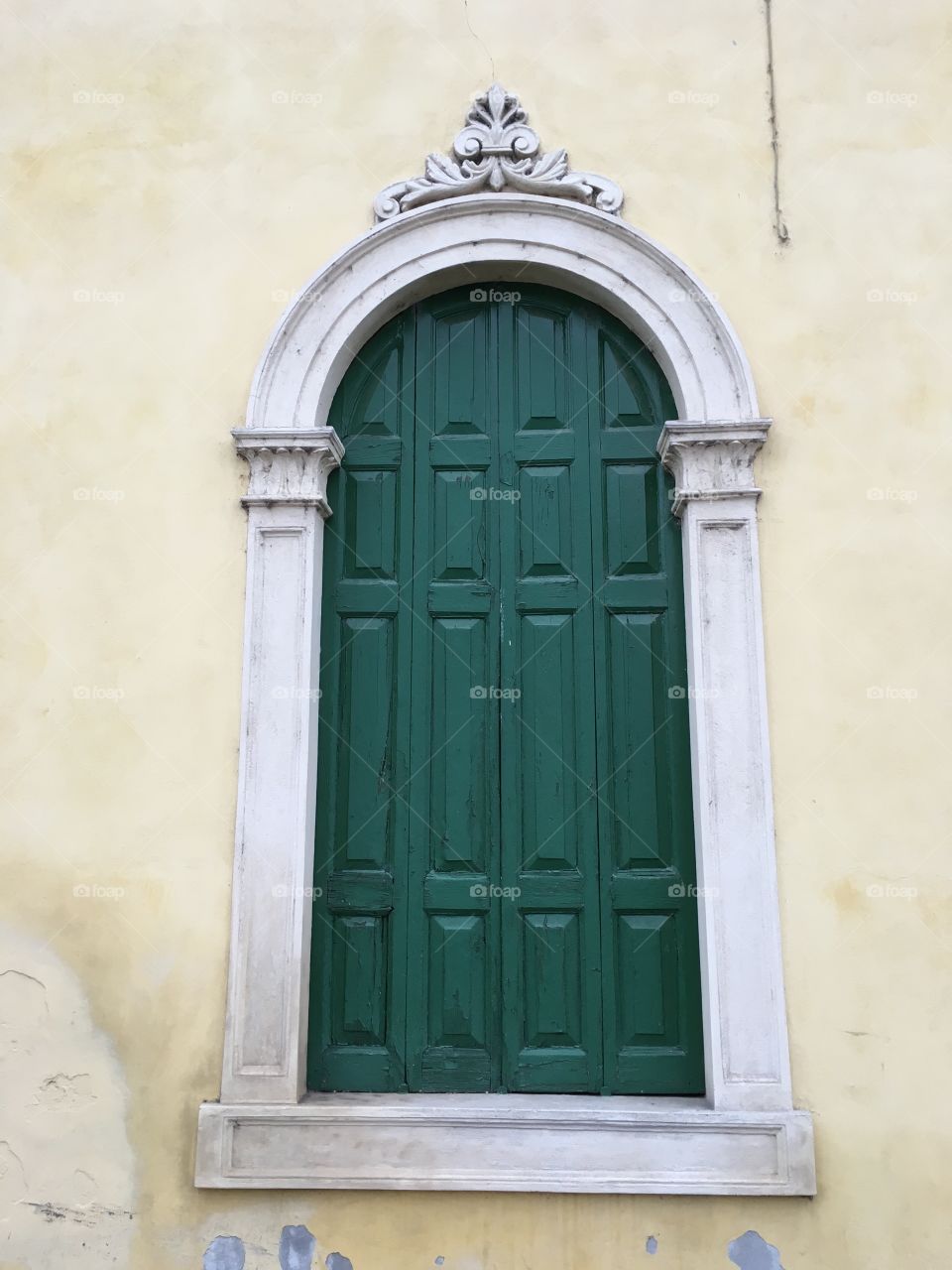 Green old door, Italy