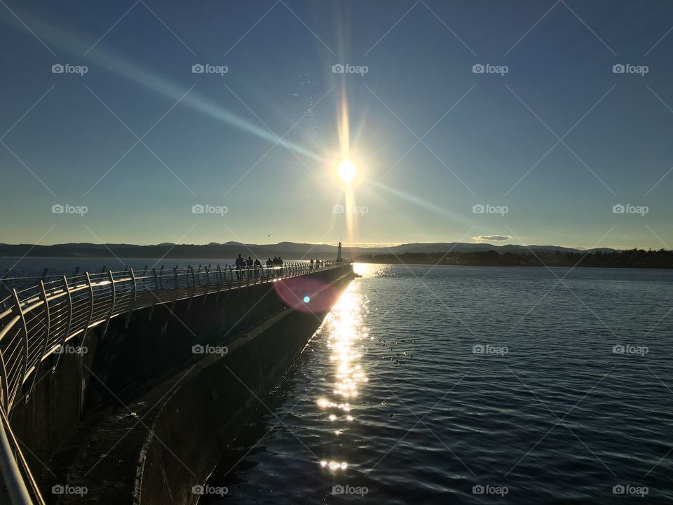 Sunbeams  over the breakwater