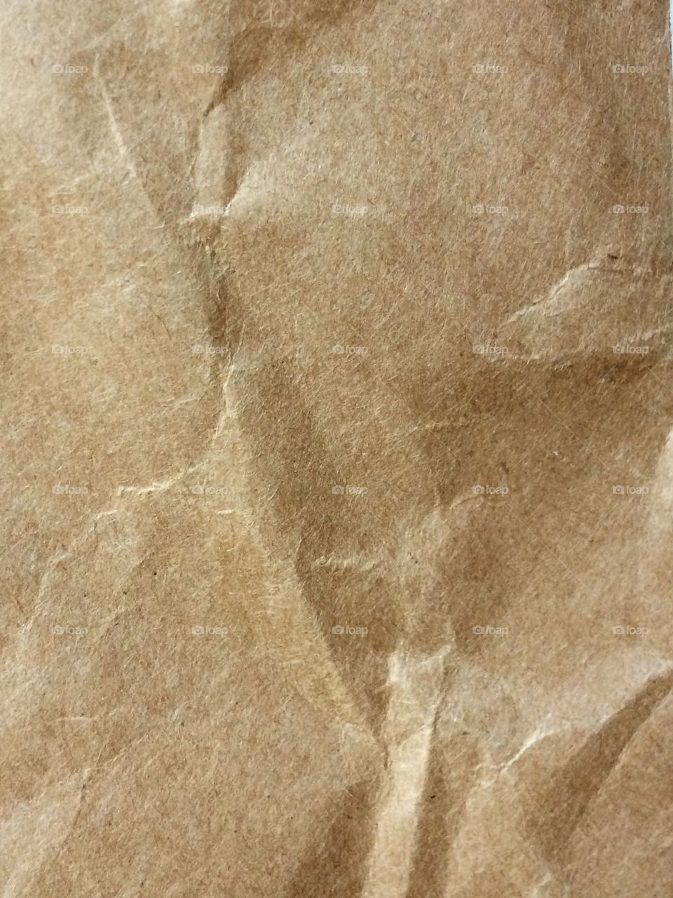 Crumpled brown paper texture 