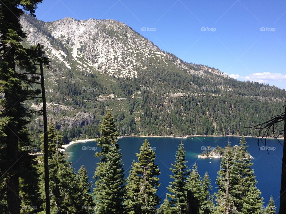 View of a blue lake from the hill