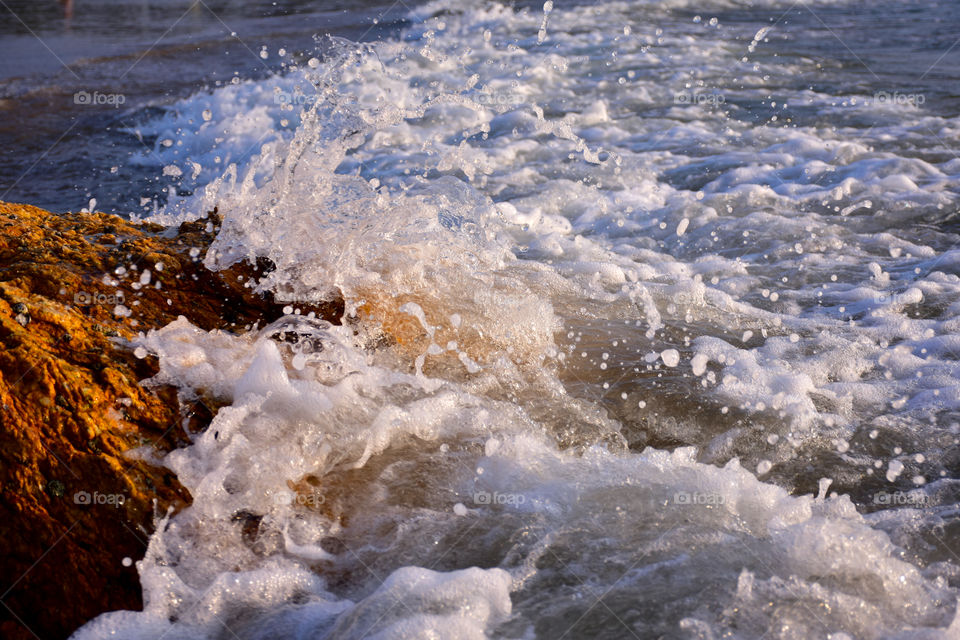 Waves breaking down on the rocks