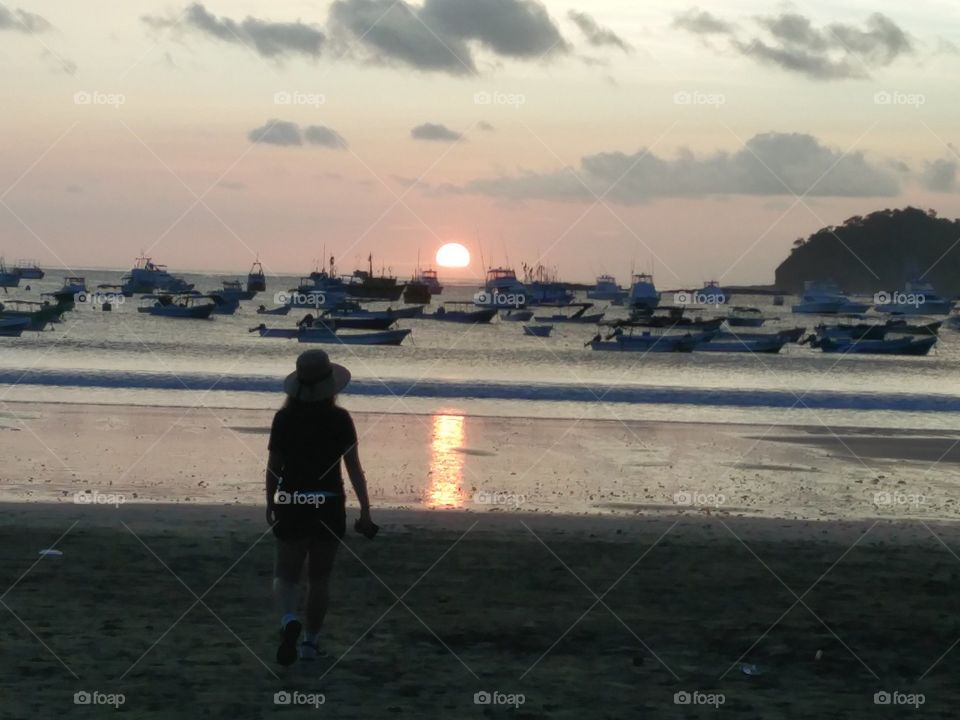 girl walking on the beach