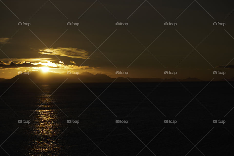 Sunset Behind The Mountain Horizon Over False Bay, South Africa