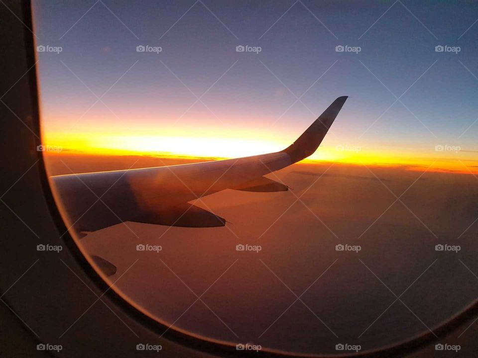 Sunrise#plane#wing#view#sky#moment