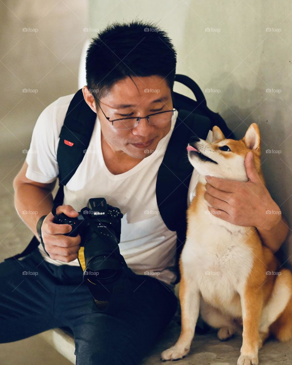 Lovable Puppy Feeling Happy with his Owner.