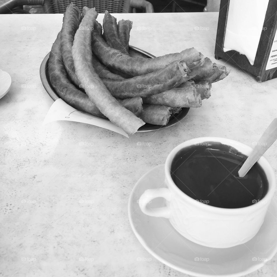 Spanish breakfast consisting of Churros con chocolate
