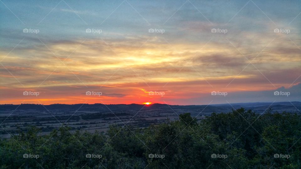 Setting sun over the farmlands.