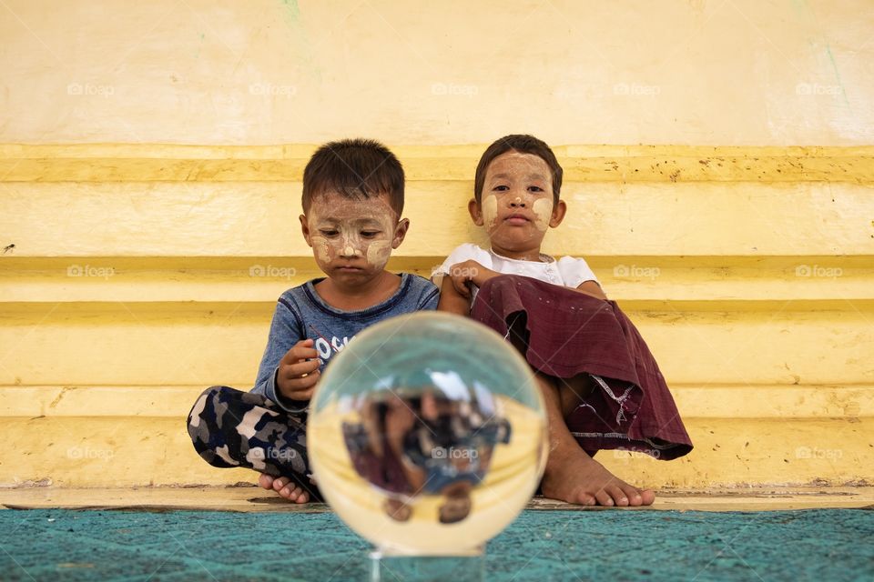 Myanmar Local life style , student sit around pagoda with their family on holiday
