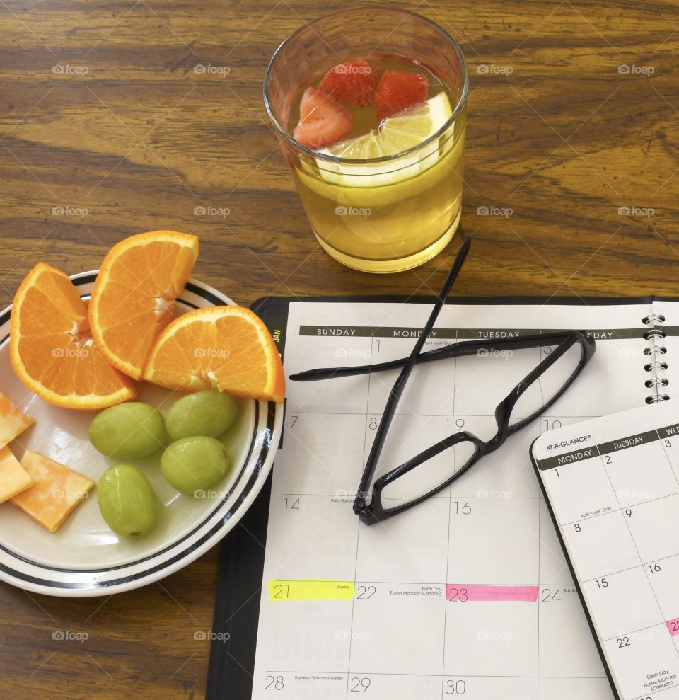 Fruit snack along side a calendar for work