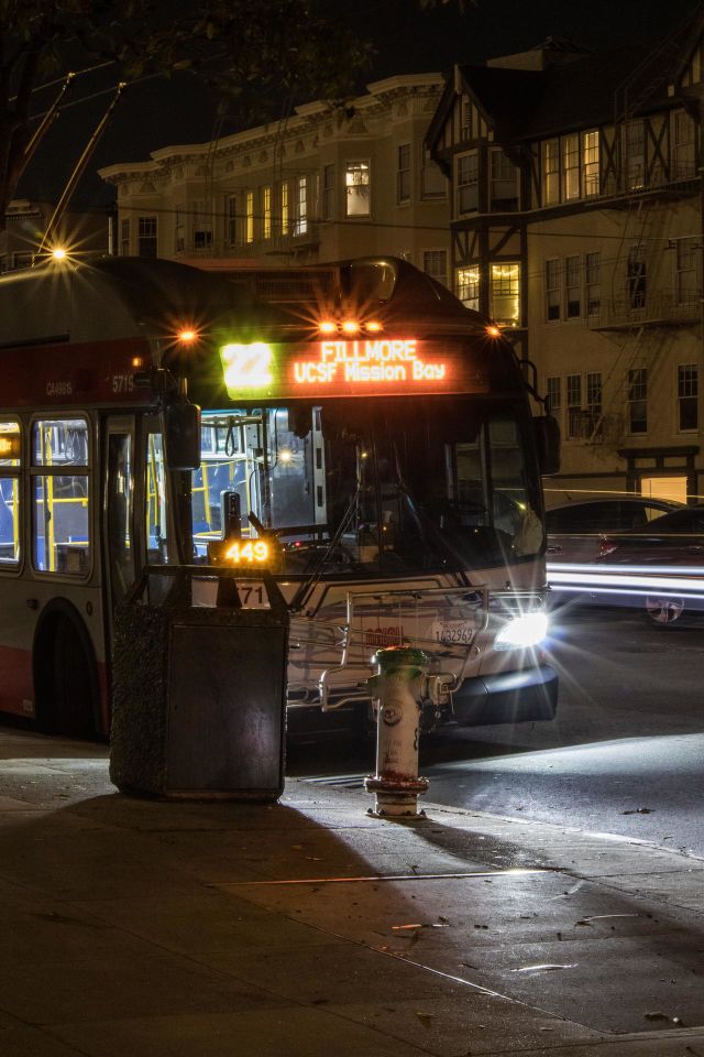 22 Fillmore bus at night in San Francisco on Fillmore Street and Bay Street at the bus stop 