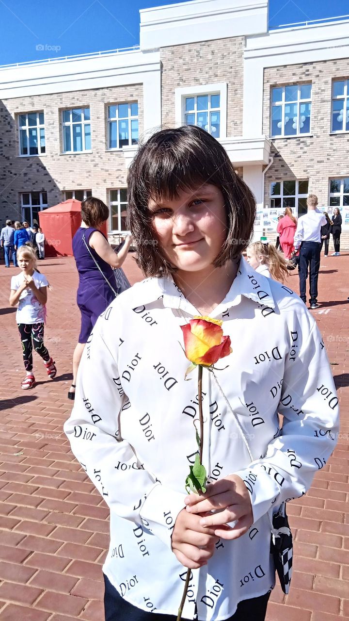 girl with a yellow rose