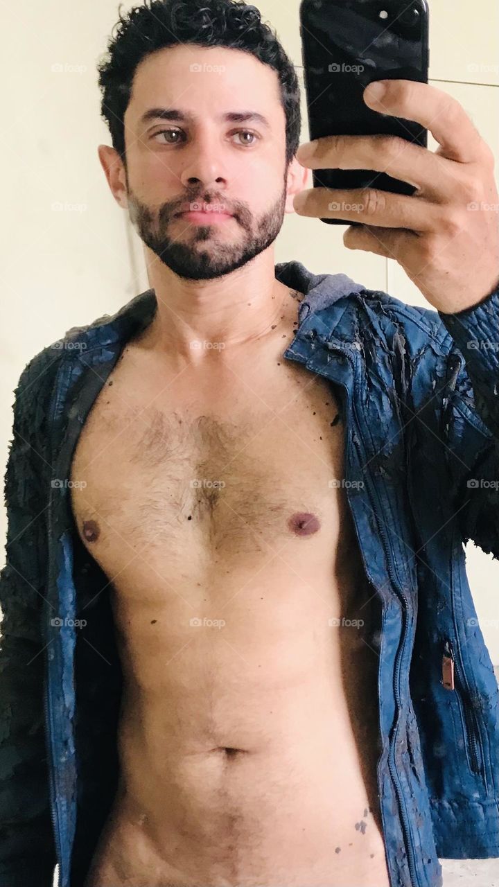 sexy guy making selfie, jacket open