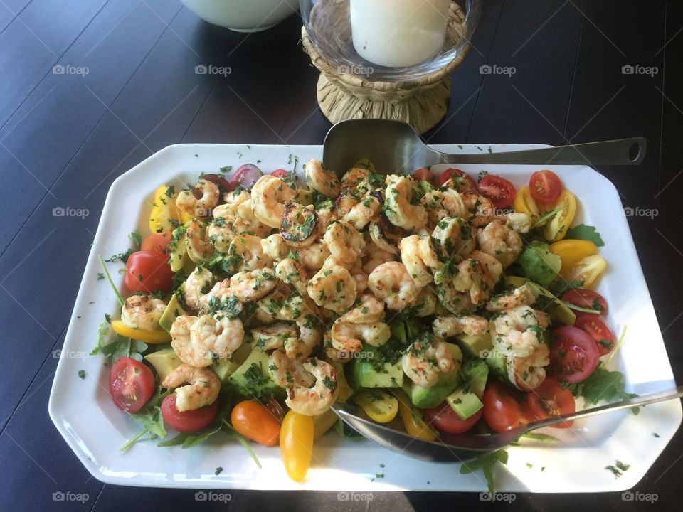 Delicious citrus and cilantro shrimp with tomatoes. 