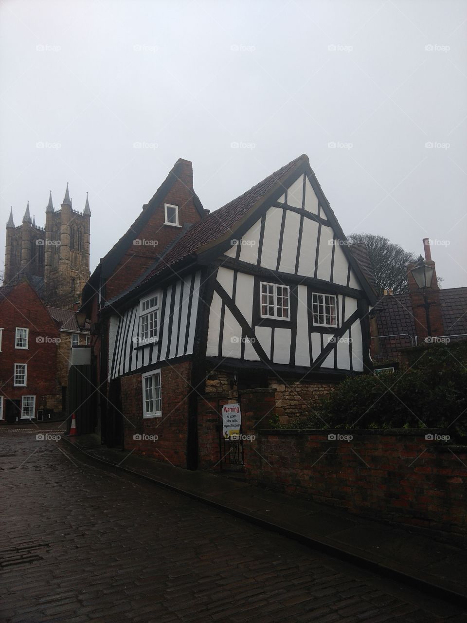 Fancy house in Lincoln, England with Lincoln cathedral in the distance