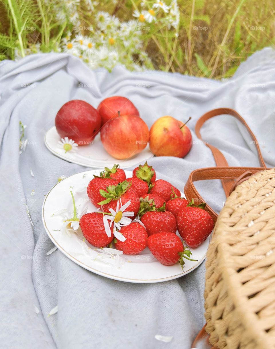 still life on a summer meadow with fruits