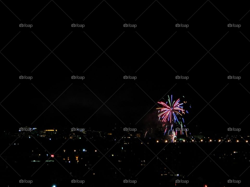 Fireworks over the city. nice spread of fireworks over city