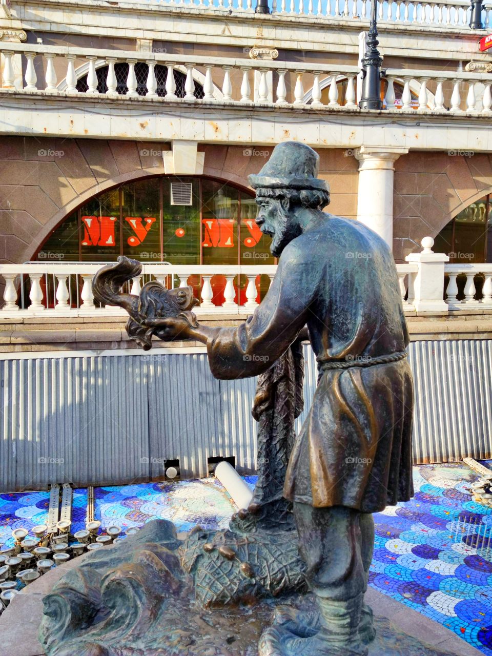 Moscow.  Autumn.  Alexander Garden.  Fountain figures based on Russian fairy tales.  The old man and the goldfish